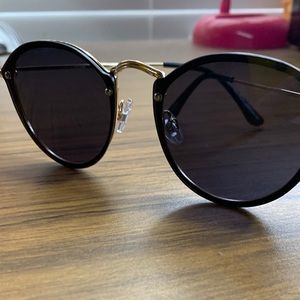 black sunglasses with gold accent